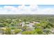 Scenic aerial view of condos with mature trees, tennis court and easy access to downtown at 5336 White Cliff Ln # 6, Orlando, FL 32812