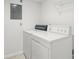 Laundry room featuring full-sized, white washer and dryer units at 5336 White Cliff Ln # 6, Orlando, FL 32812