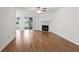 Inviting living room with a ceiling fan, fireplace, and sliding glass door to patio at 5336 White Cliff Ln # 6, Orlando, FL 32812