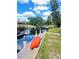 Backyard waterfront with private boat dock, kayak, and canal views at 5374 Crooked Oak Cir, St Cloud, FL 34771