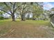 Sprawling backyard with mature trees and well-maintained lawn at 5374 Crooked Oak Cir, St Cloud, FL 34771