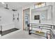 Contemporary bathroom featuring dual shower heads, a floating vanity, and stylish fixtures, creating a spa-like retreat at 5374 Crooked Oak Cir, St Cloud, FL 34771