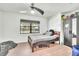 Neutral bedroom with a ceiling fan and natural light at 5374 Crooked Oak Cir, St Cloud, FL 34771
