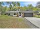Charming single Gathering home with a two car garage and stone accents at 5374 Crooked Oak Cir, St Cloud, FL 34771