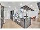 Modern kitchen featuring a large island, sleek cabinets, and stainless steel appliances at 5374 Crooked Oak Cir, St Cloud, FL 34771