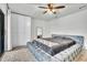 A lovely bed and a set of built-in closet in the main bedroom at 5374 Crooked Oak Cir, St Cloud, FL 34771