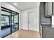 Bright sunroom leads to outdoor patio, boasting modern finishes and a seamless transition at 5374 Crooked Oak Cir, St Cloud, FL 34771