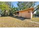 Back exterior of a home showing the yard at 6424 Jenny Dr, Lake Wales, FL 33898