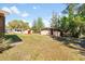 Large backyard with storage sheds and lots of shady spots for relaxation at 6424 Jenny Dr, Lake Wales, FL 33898