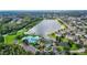 Beautiful aerial view of the pool and lake at 6854 Remington View Ct, Orlando, FL 32829