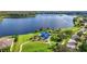 Community park with playground and walking path alongside a lake in a residential area at 6854 Remington View Ct, Orlando, FL 32829