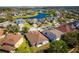 Aerial view of a house in a lakeside neighborhood at 6854 Remington View Ct, Orlando, FL 32829