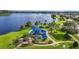 Aerial view of a playground and lake at 6854 Remington View Ct, Orlando, FL 32829