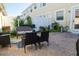 Charming brick-paved backyard featuring cozy outdoor seating and a well-maintained garden at 7407 Ripplepointe Way, Windermere, FL 34786