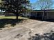 View of the front of the property with driveway and partial lawn at 818 Logan Dr, Longwood, FL 32750