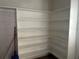 View of pantry with multiple shelves for storage at 818 Logan Dr, Longwood, FL 32750