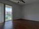 Bright bedroom with sliding doors to the balcony at 824 Town Cir # 101, Maitland, FL 32751