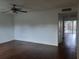 Spacious living room featuring updated flooring and a neutral color palette at 824 Town Cir # 101, Maitland, FL 32751