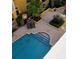 An aerial view of the swimming pool surrounded by a stylish patio at 860 N Orange Ave # 468, Orlando, FL 32801