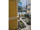 Courtyard view with brick walkway and bench seating at 860 Orange Ave # 259, Orlando, FL 32801