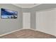 Cozy bedroom with a wall-mounted TV and large closets for ample storage at 929 Arbormoor Pl, Lake Mary, FL 32746