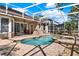 Inviting screened-in pool area with a jacuzzi, perfect for relaxation and entertaining at 929 Arbormoor Pl, Lake Mary, FL 32746