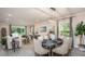 Elegant dining area connected to the living room, featuring stylish decor and plenty of natural light at Tbd Shirley Shores Rd, Tavares, FL 32778