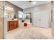 Bathroom features dual sinks, soaking tub, walk-in shower, and large closet space at 10544 Spring Lake Dr, Clermont, FL 34711