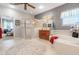 Bright bathroom featuring a soaking tub, separate shower, and vanity with wood cabinetry at 10544 Spring Lake Dr, Clermont, FL 34711
