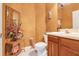 Stylish half bath features unique decor and fixtures at 10544 Spring Lake Dr, Clermont, FL 34711