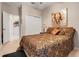 Bedroom features bright window, neutral walls, and closet space at 10544 Spring Lake Dr, Clermont, FL 34711