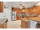 This charming kitchen features stainless steel appliances, granite countertops, and ample cabinet space at 10544 Spring Lake Dr, Clermont, FL 34711