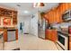 Updated kitchen with custom cabinetry, granite countertops, and stainless steel appliances at 10544 Spring Lake Dr, Clermont, FL 34711
