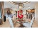 Spacious open-concept layout showcases a seamless flow between the dining area, living room, and modern kitchen at 10544 Spring Lake Dr, Clermont, FL 34711
