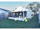 Backyard view of screened in lanai at 107 Broadarrow Pl, Sanford, FL 32773