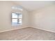 Comfortable bedroom with carpeting and natural light from a large window at 107 Broadarrow Pl, Sanford, FL 32773