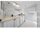 Bathroom boasts dual sinks, quartz countertops, and contemporary fixtures at 13643 Budworth Cir, Orlando, FL 32832