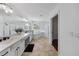 Bright bathroom features a double vanity, soaking tub and glass-enclosed shower at 13643 Budworth Cir, Orlando, FL 32832