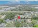 An aerial view shows the property's proximity to nearby highways, businesses, and residential areas at 142 Stone Hill Dr, Maitland, FL 32751