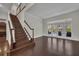 Grand foyer with a staircase leading to the second floor, offering access to the pool and rear grounds of the home at 142 Stone Hill Dr, Maitland, FL 32751