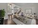 Elegant living room with hardwood floors, stylish furniture, and plenty of natural light at 142 Stone Hill Dr, Maitland, FL 32751