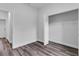 Minimalist bedroom features a spacious closet, light gray walls, and modern flooring at 16904 Sw 30Th Avenue Rd, Ocala, FL 34473