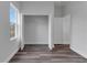 View of a bedroom with an open closet and a window allowing ample natural light to come in at 16904 Sw 30Th Avenue Rd, Ocala, FL 34473