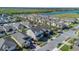 Aerial view of the neighborhood showcasing the well-maintained homes and landscaping at 1702 Reflection Ln, St Cloud, FL 34771