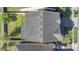 Birds-eye view of a home's roof with architectural shingles and a well-maintained yard at 1702 Reflection Ln, St Cloud, FL 34771