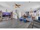 Spacious living room features lots of natural light, cozy fireplace, and an open layout at 1702 Reflection Ln, St Cloud, FL 34771