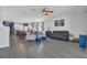 Spacious living room features lots of natural light and an open layout to the dining area and kitchen at 1702 Reflection Ln, St Cloud, FL 34771