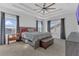 Serene bedroom with tray ceilings, generous natural light, and a relaxing atmosphere at 1702 Reflection Ln, St Cloud, FL 34771
