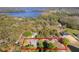 An aerial view of the property line showcases the lot size, pool, and mature landscaping at 17220 Countrybrook Ln, Orlando, FL 32820