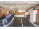 Spacious garage with ample storage, workspace, and organized shelving at 17220 Countrybrook Ln, Orlando, FL 32820